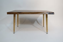 Load image into Gallery viewer, live edge, danish modern-style side or accent table in black walnut slab. Table has repurposed Paul McCobb-style tapered legs danish for a cool mid century modern look