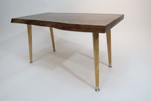Load image into Gallery viewer, live edge, danish modern-style side or accent table in black walnut slab. Table has repurposed Paul McCobb-style tapered legs danish for a cool mid century modern look