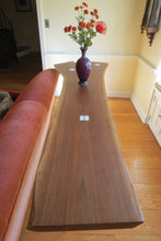 Load image into Gallery viewer, live edge black walnut console or hall table, comprising intricate crotch slab and distressed, upcycled white legs.  Unique, hancrafted, three-legged, cantilevered design