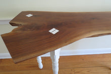 Load image into Gallery viewer, live edge black walnut console or hall table, comprising intricate crotch slab and distressed, upcycled white legs.  Unique, hancrafted, three-legged, cantilevered design