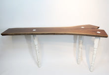 Load image into Gallery viewer, live edge black walnut console or hall table, comprising intricate crotch slab and distressed, upcycled white legs.  Unique, hancrafted, three-legged, cantilevered design