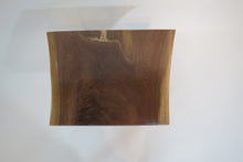 Load image into Gallery viewer, live edge side or accent table, comprising trapezoid shaped black walnut slab and hand-forged steel hairpin legs. Handcrafted for a cool mid century modern look.