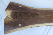 Load image into Gallery viewer, unique hancrafted live edge table in black walnut. Coffee table comprises beautiful crotch slab with white distressed legs that are through-tenoned for a modern look