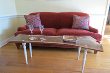 Load image into Gallery viewer, unique hancrafted live edge table in black walnut. Coffee table comprises beautiful crotch slab with white distressed legs that are through-tenoned for a modern look