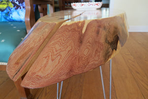 live edge side or accent table comprised of a beautiful bias cut spalted ambrosia maple ccent table. Unique oval shape, handcrafted and on hand forged hairpin legs for a mid-century modern look