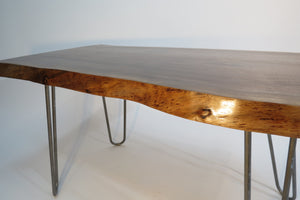 live edge walnut side or accent table with hand forged hairpin legs.  Handcrafted, for a cool mid century modern look